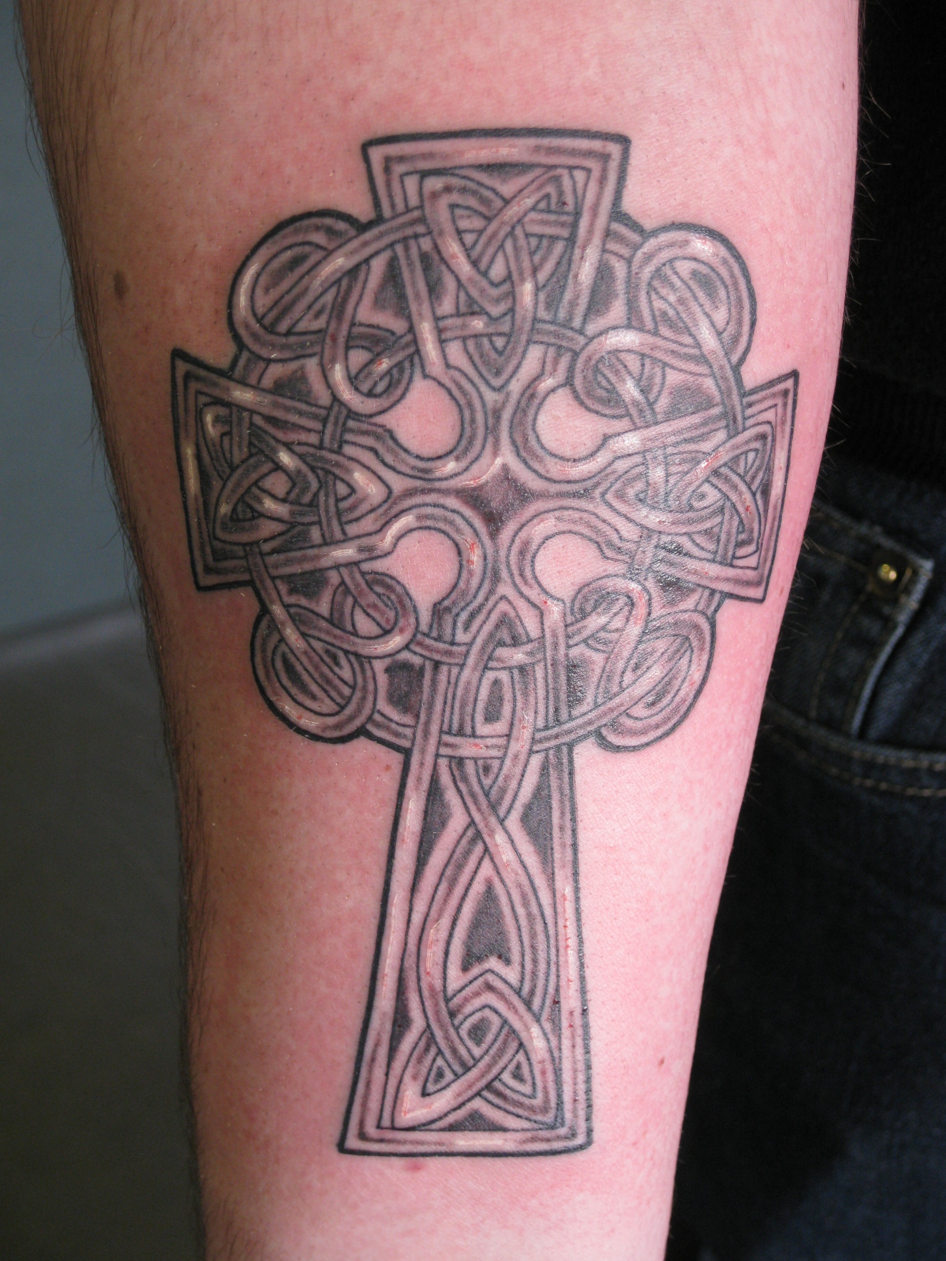 Cross rosary tattoo