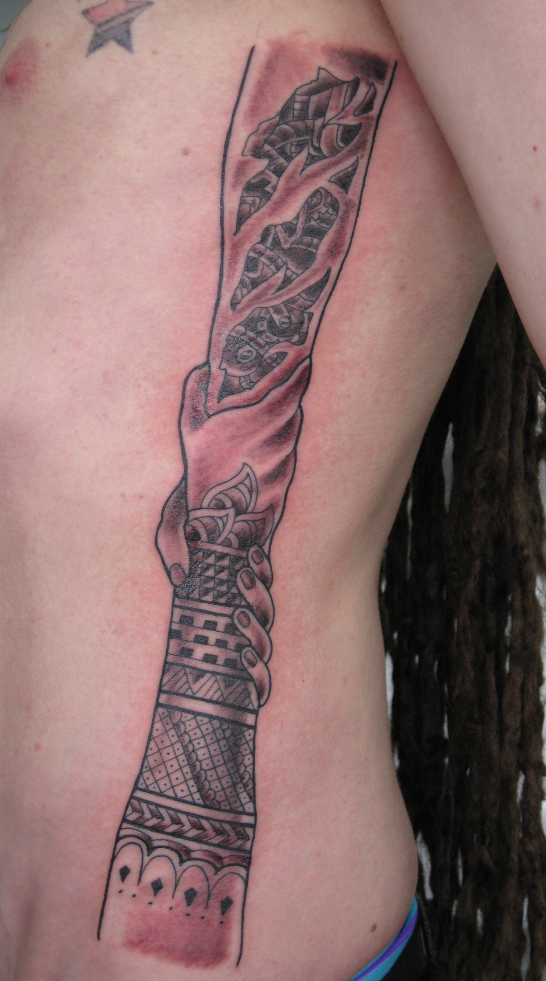Shaking hands tribal & biomech rib tattoo. Posted in Tattoos with tags bio,